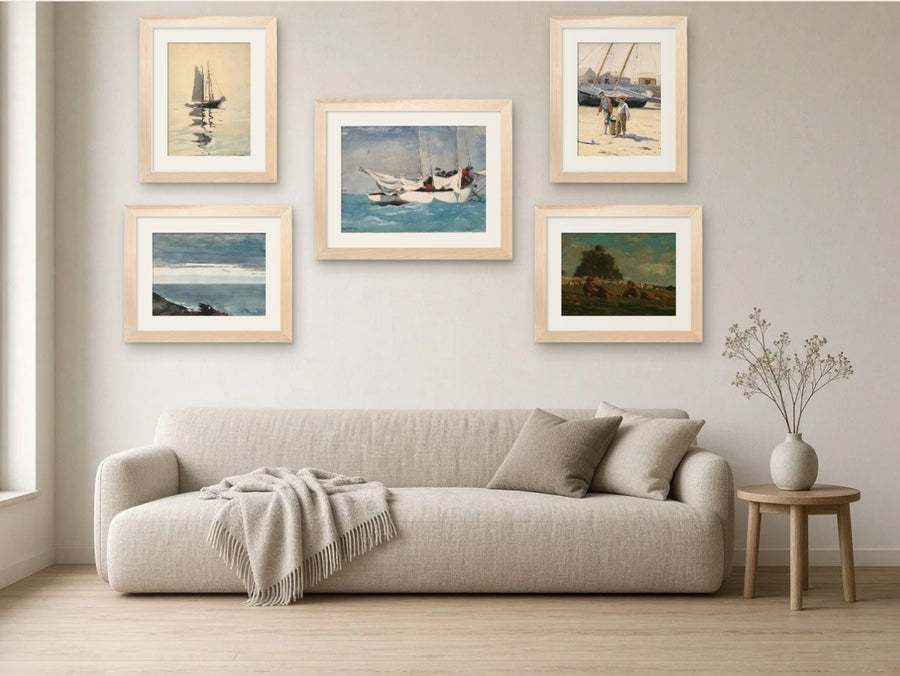 Homer’s Atlantic gallery wall, Light Wood frames, in a living room