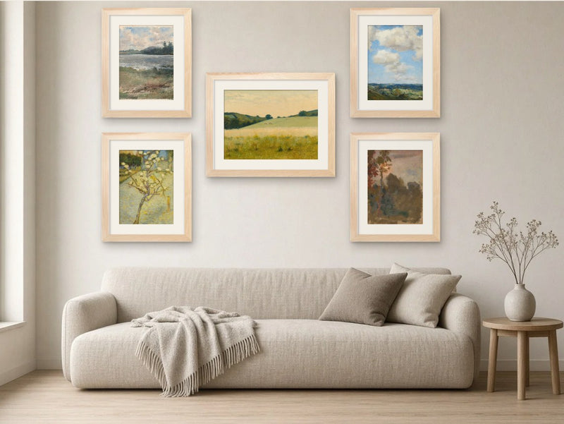 Golden Fields gallery wall, Light Wood frames, in a living room