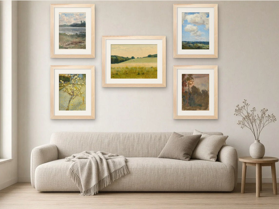 Golden Fields gallery wall, Light Wood frames, in a living room