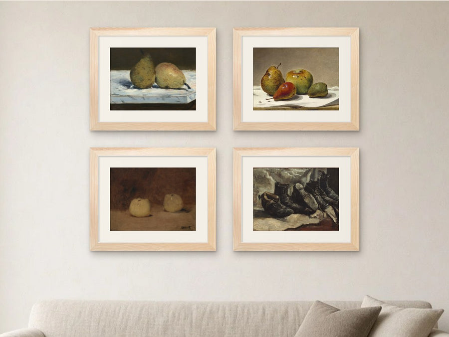 The Kitchen Table gallery wall, Light Wood frames, in a living room